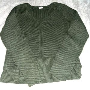 Green sweater with slits on the sides